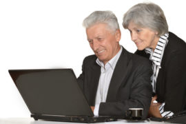 50745578 - older couple in the workplace on a white background